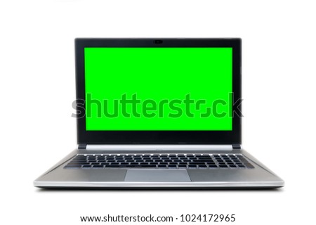 front view af isolated grey and black laptop with green screen