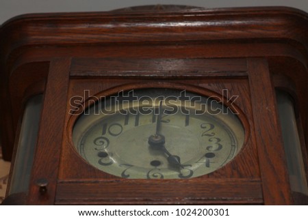 Dial of ancient wooden clock, bottom view