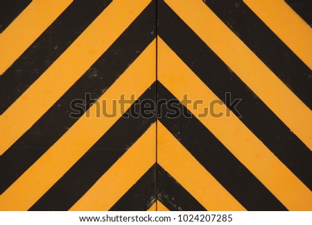 YELLOW AND BLACK PAINTED CHEVRON PATTERN
