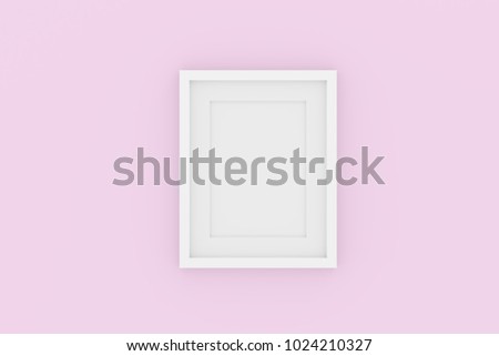Blank picture frame template for place image or text inside on pastel pink wall.