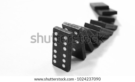 falling dominoes. domino effect. the domino game.
 Royalty-Free Stock Photo #1024237090