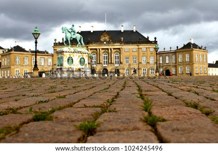Amalienborg Palace is the home of the Danish Royal Family and is located in Copenhagen.