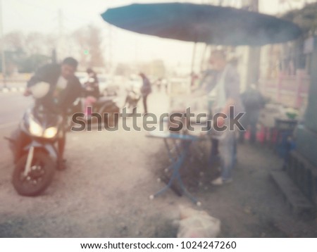 Blurry image in the city of food street Thailand in the morning ,esay food bbq grill ,need blur picture