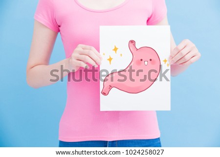 woman take health stomach billboard on the blue background