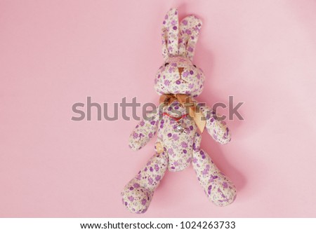 plush Bunny on a pink background