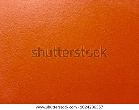 Abstract orange concrete wall background