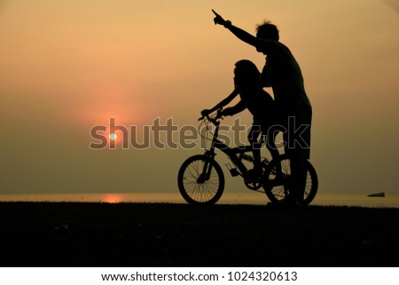 Happy family time, Silhouette people activity at sun set.