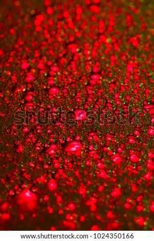 red and green bubbles on the glass macro