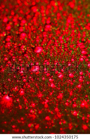 red and green bubbles on the glass macro