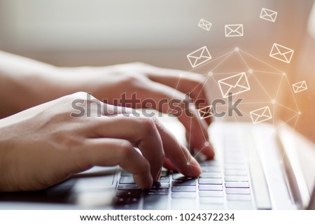 Closeup Woman hand using Laptop with email icon, Email concept.selective focus. Royalty-Free Stock Photo #1024372234