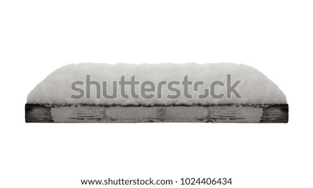 wood plank with fresh snow in winter isolated on white background