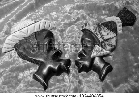 kissing the heads of Cuban women and men a souvenir of wood Royalty-Free Stock Photo #1024406854