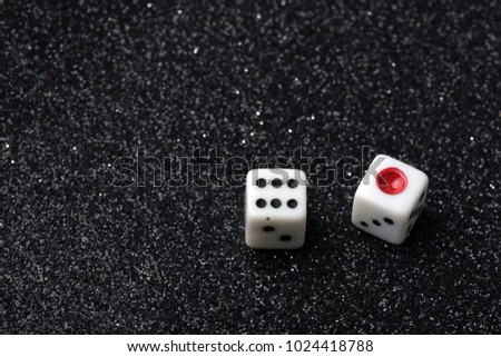 game dice on a black background