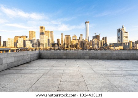 empty marble floor with modern office building in beijing china