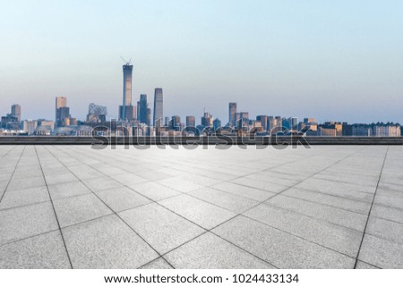 empty marble floor with modern office building in beijing china