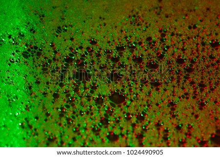 
colorful small soap bubbles with backlight