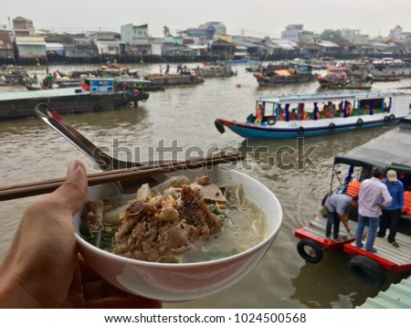 Royalty high quality free stock image of Vietnamese noodles (Hu tieu) on Cai Rang floating market