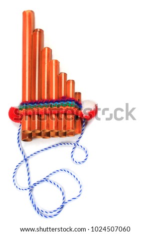 Pan flute on white background