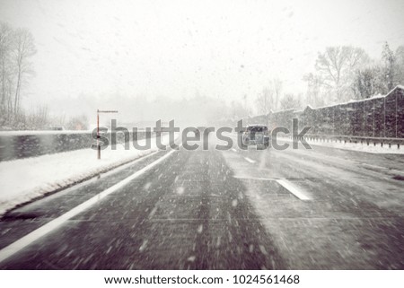 Highway in heavy snowfall