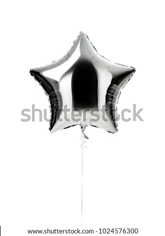 Single big silver star balloon object for birthday  party isolated on a white background