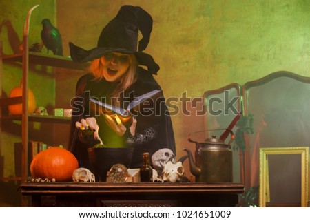 Image of witch with spell book in dark room