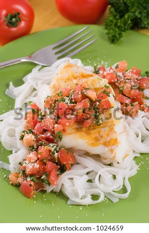 Linguine and grilled cod fillet  toped with tomato pesto