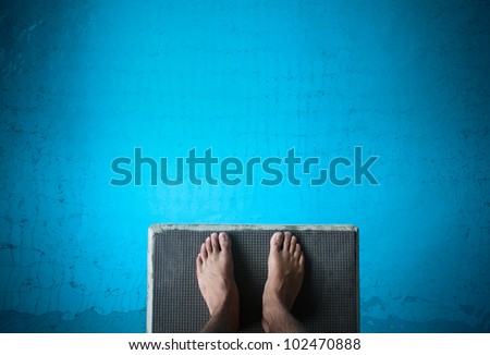 feet on diving board Royalty-Free Stock Photo #102470888