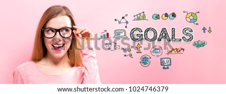 Goals with happy young woman holding her glasses