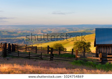 Dawn's Light view of out buildings and vast landscape of The Dallas Mountain Ranch, a popular hiking and picture taking place that is part of the Columbia Hills Natural Preserve and State Park.