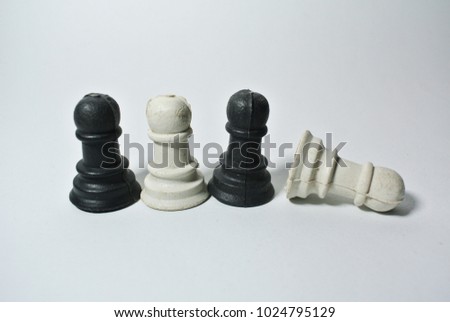 Chess objects on the white background with simple and creative concept. 