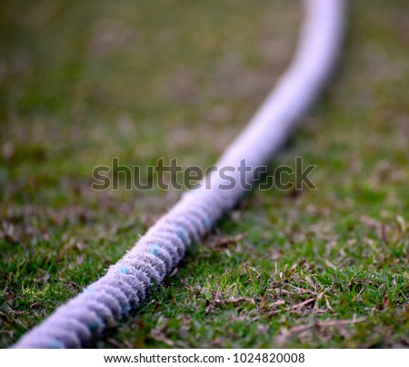 White cricket boundary rope isolated object stock photograph