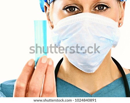 Coronavirus outbreak with woman surgeon wearing a mask on white background stock photo