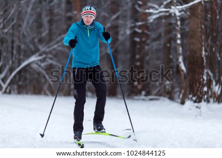 Picture of athlete skier at winter day