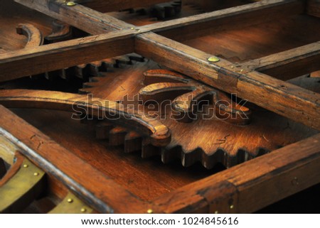 Old grunge wooden mechanism closeup picture. Background
