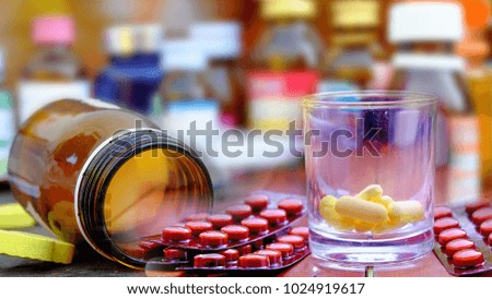 Medicine,tablets, liquid medicine, placed on the table.Pharmacy theme,