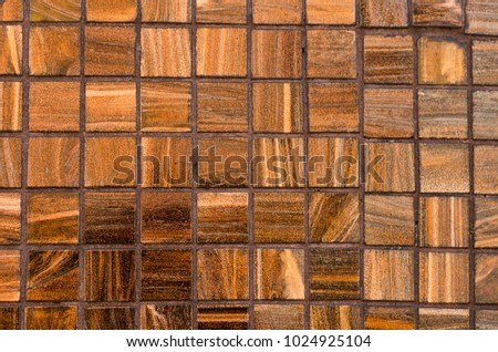 Golden brown rectangular patterned backgrounds.