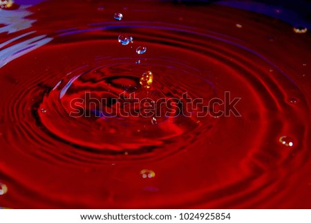 splashing red water