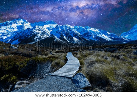 Mountain track with milkyway background