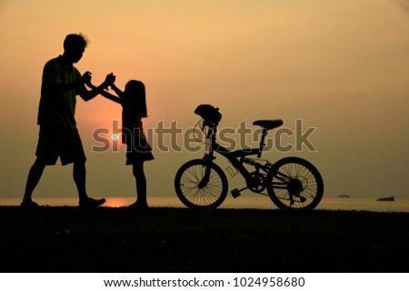 Happy family time, Silhouette people activity at sun set.
