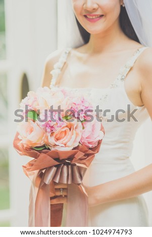 The bride and her flower.