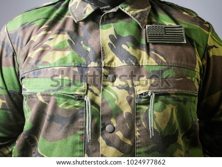 Closeup army uniform. Closeup photo of a  male chest standing in military jacket.