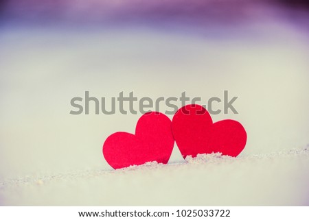 Two red hearts on the summer beach. Love, Wedding and Valentines day concept.