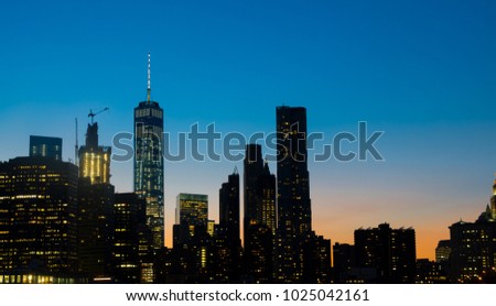 Manhattan New york business center  skyscraper building at sunset viewed from Brooklyn, New york USA
