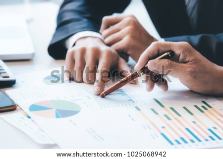 Young startups businessmen teamwork brainstorming meeting to discuss the investment. Royalty-Free Stock Photo #1025068942