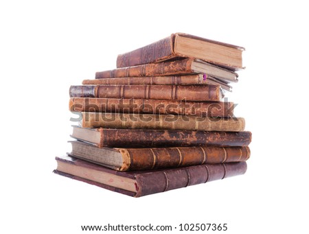 Stack of nine antique books, isolated white background Royalty-Free Stock Photo #102507365