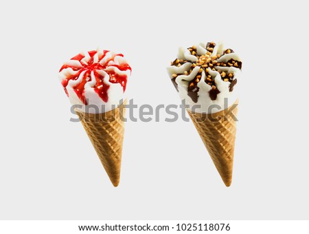 Chocolate and strawberry sorts of Ice Cream in a waffles isolated on grey background  Royalty-Free Stock Photo #1025118076