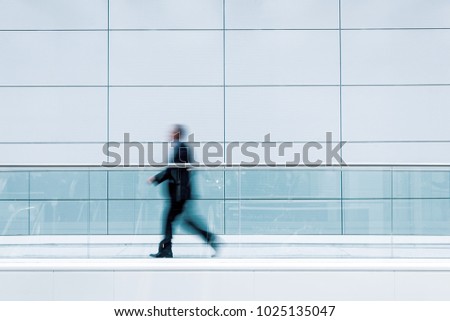 Futuristic environment with blurred people business concept