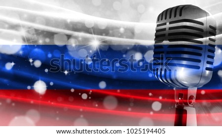 Microphone on a background of a blurry flag Russia close-up