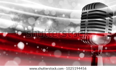 Microphone on a background of a blurry flag Poland close-up