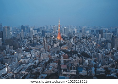 Tokyo Tower Night View - Business city concept image, modern cityscape building in evening, shot in Roppongi Hills of Minato Ward, Tokyo, Japan.